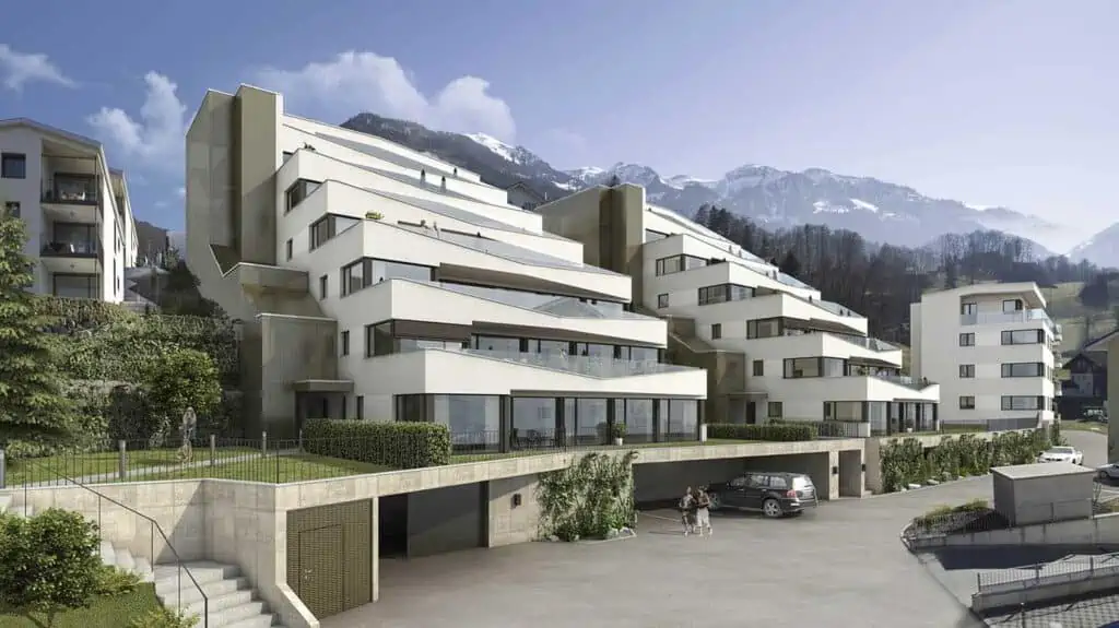 Eine künstlerische Darstellung eines Apartmentkomplexes in den Bergen mit 3D-Visualisierungen.