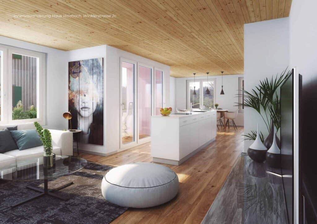 Eine Broschüre, die ein Wohnzimmer mit Holzdecke und weißen Möbeln im Am Wildbach zeigt.